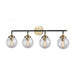 Boudreaux 4-Light Vanity Lamp in Matte Black and Antique Gold with Sphere-shaped Glass